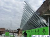 Installing the parapet around the perimeter of the top roof at the North Elevation.jpg